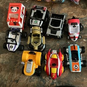 Ryans world cars, trucks, and mixed toys, treasure chest and space ship egg used